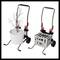 'Zwei Handkarren. Links eine Topfpflanze, rechts eine Kiste mit Flaschen. Beide Karren haben Griff und Räder.'