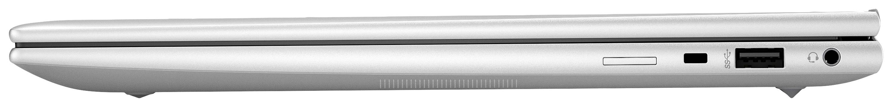 Geschlossener Laptop von der Seite mit USB-Anschluss, LAN-Eingang und Lüftungsschlitzen sichtbar.