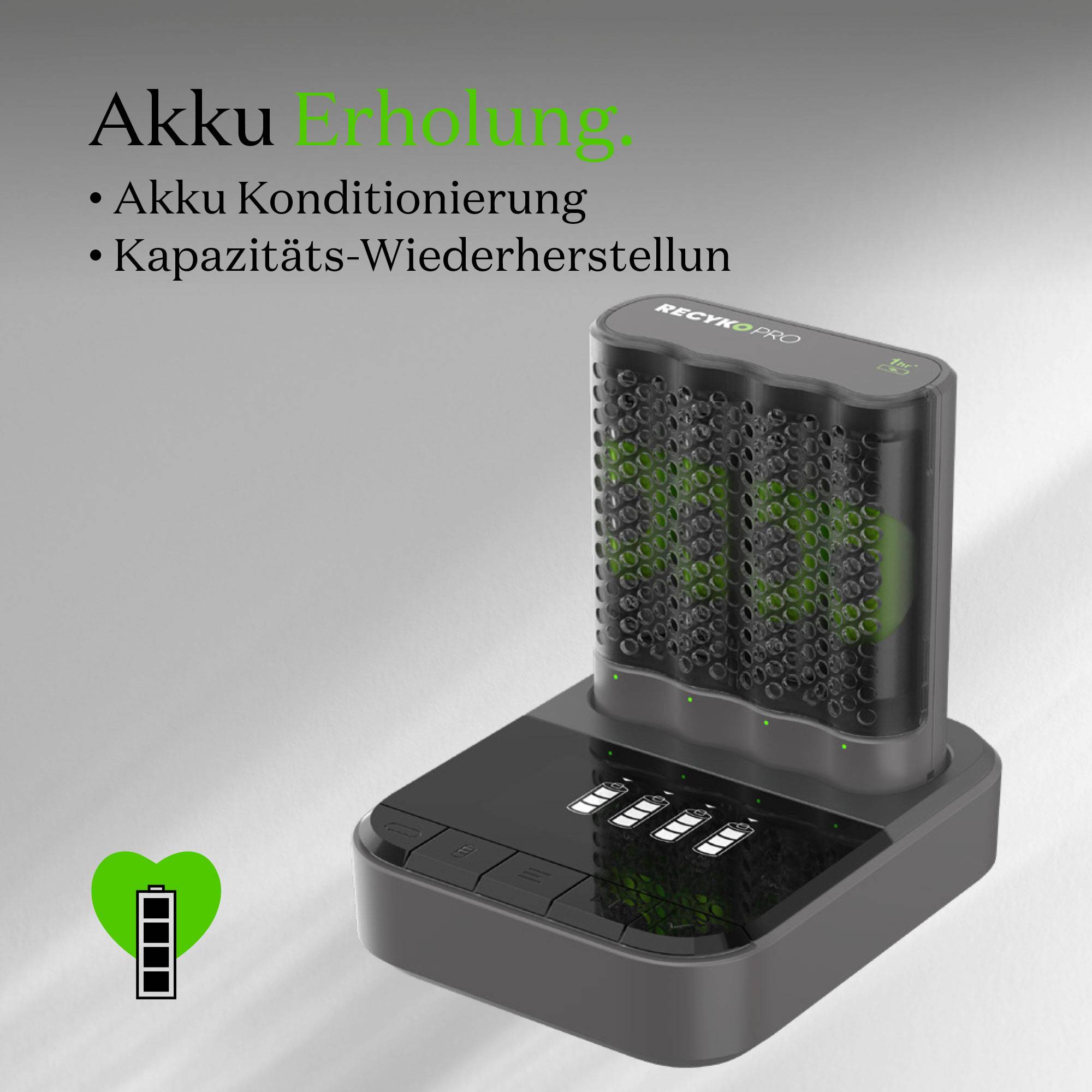Ein Ladegerät mit der Aufschrift 'Akku Erholung', das Akkus auflädt und ihnen Kapazität zurückgibt. Ein grünes Herzsymbol ist sichtbar.
