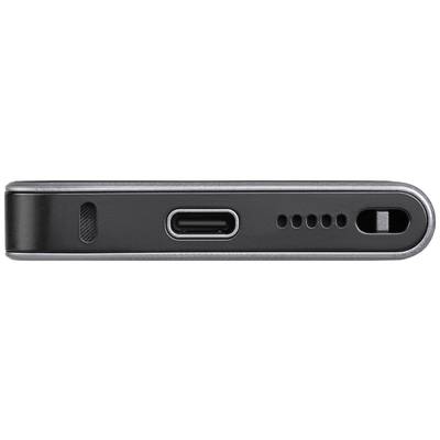 USB-C-Anschluss an einem schwarzen Gerät, umgeben von mehreren vertikalen Belüftungsschlitzen und einem rechteckigen Schalter auf der rechten Seite.