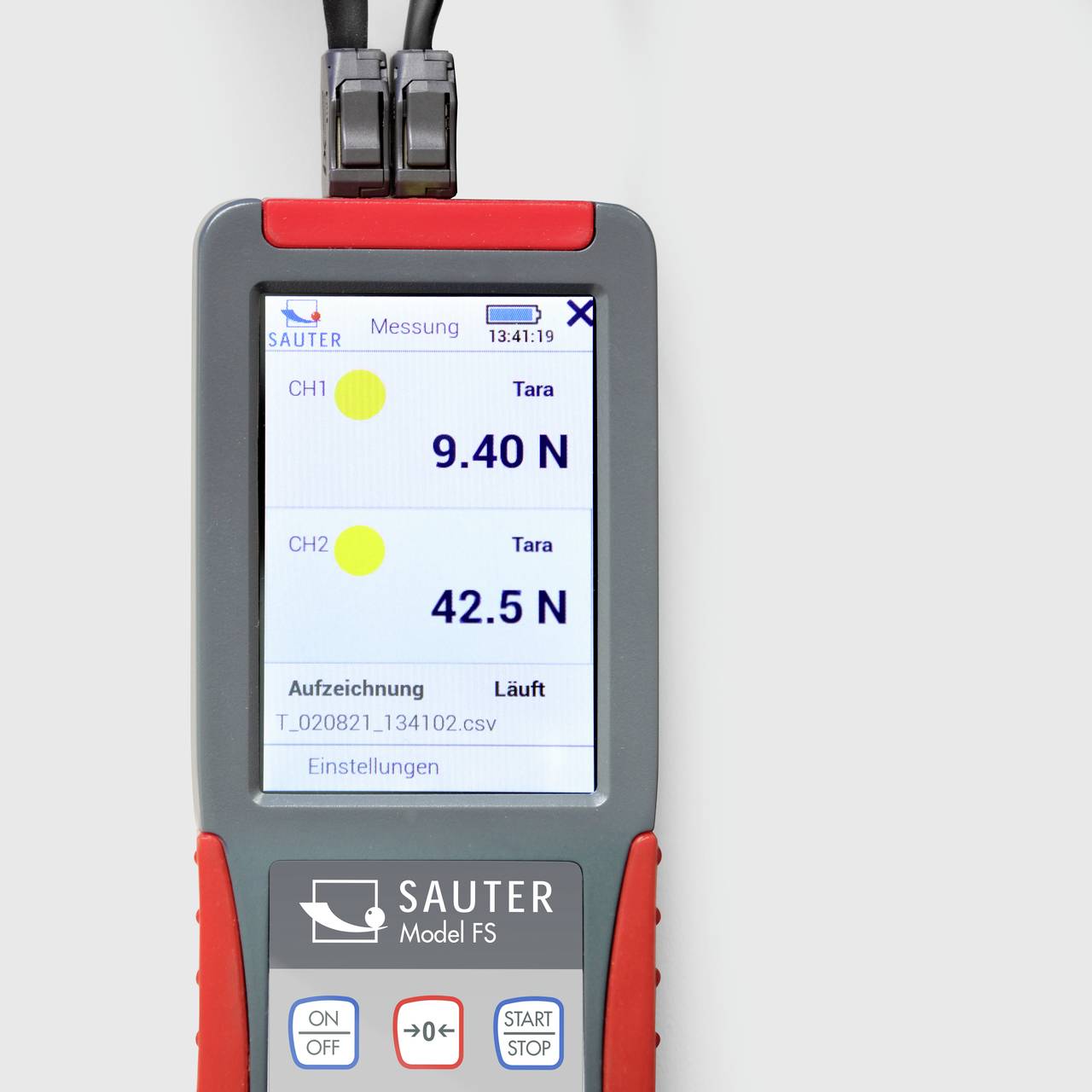 Ein tragbares Prüfgerät zeigt eine Messung von 9,40 N an. Darunter steht 'Aufzeichnung 42,5 N'. Das Gerät gehört zur 'SAUTER Modell FS' Serie.