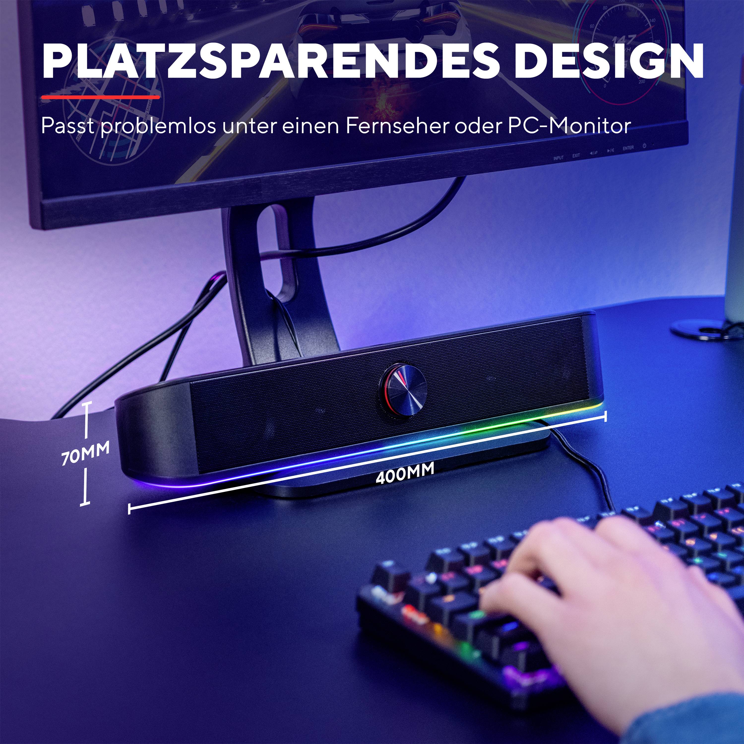 Soundbar unter einem PC-Monitor auf einem Schreibtisch. Text: 'Platzsparendes Design', misst 70 mm hoch und 400 mm breit.