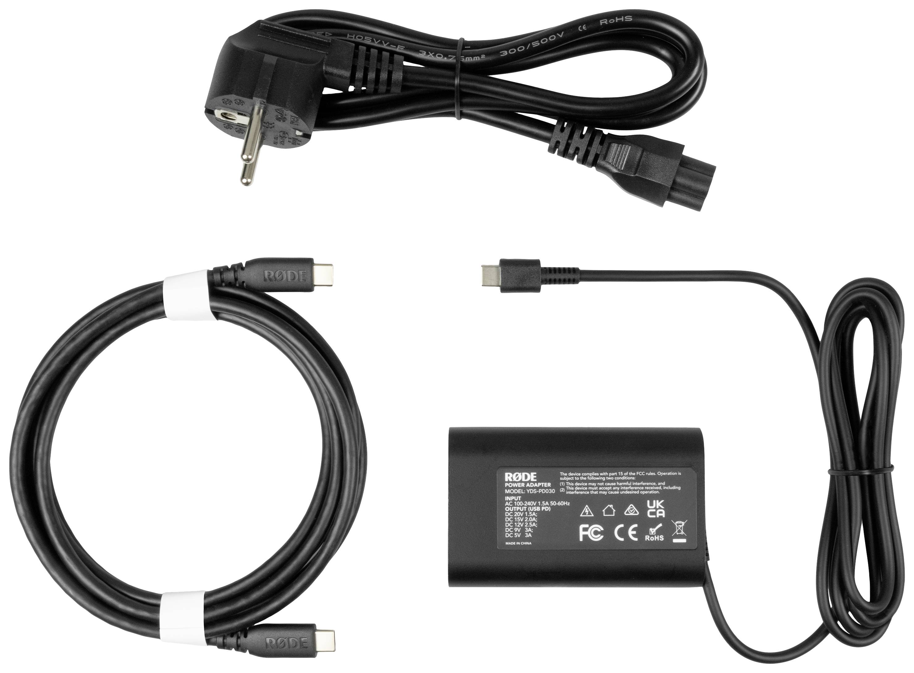 Ladegerät-Set mit Netzteil, einem Kabel mit EU-Stecker und einem USB-C-Kabel, geeignet für Laptops. CE- und FC-Zertifizierung aufgedruckt.