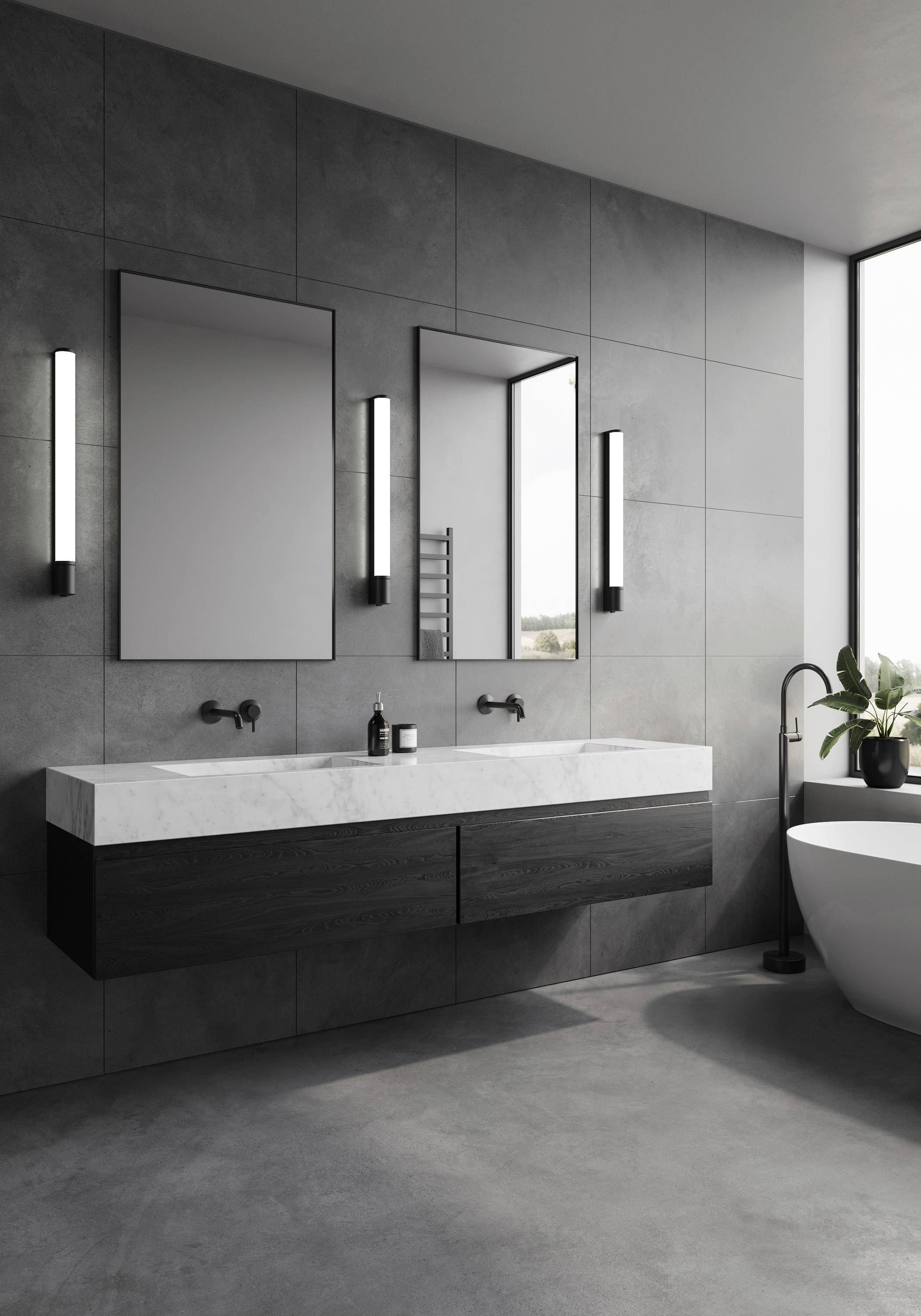 Ein modernes Badezimmer mit zwei Spiegeln, einem doppelten Waschtisch mit dunklen Schubladen und einer freistehenden Badewanne.