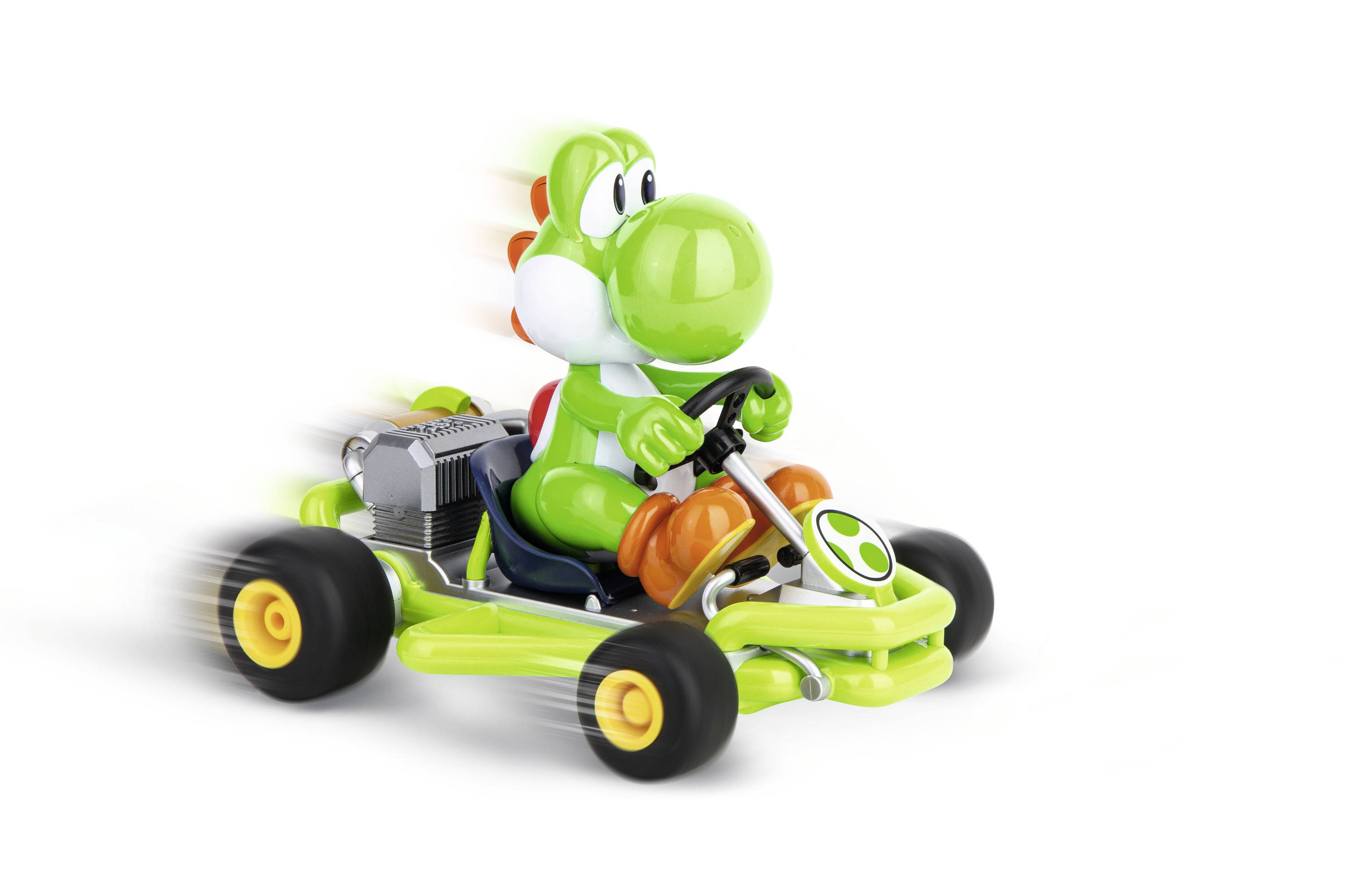 Eine grüne Spielfigur in einem Karts mit vier Rädern fährt schnell, dargestellt durch Bewegungsunschärfe.