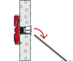 Seitliche Ansicht einer Wandeinbauhalterung: Eine rote Klemme fixiert ein rundes Metallteil. Ein Pfeil zeigt, wo eine Stange eingeführt wird.