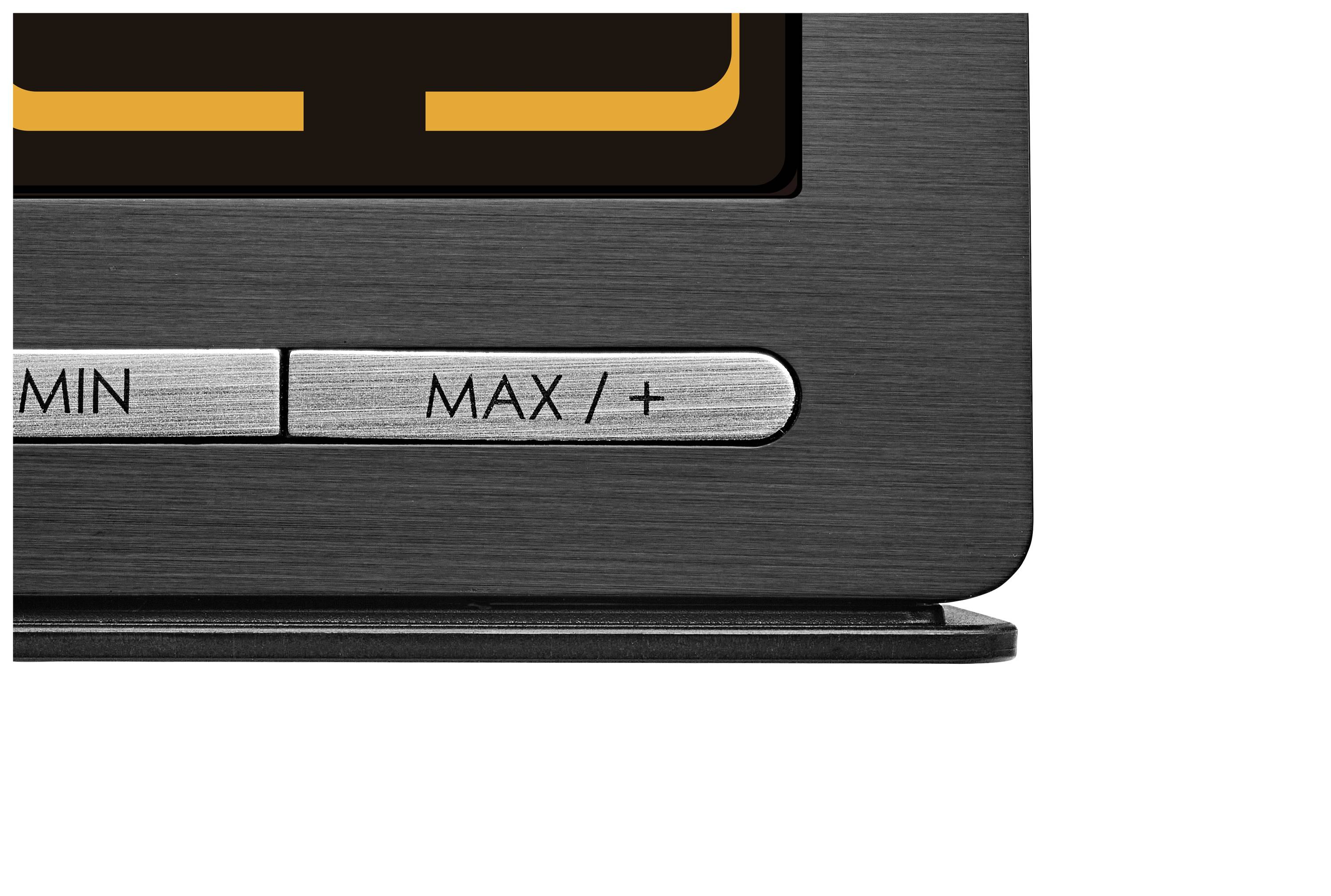 Schwarz-graue Oberfläche eines Geräts mit zwei silbernen Knöpfen: 'MIN' und 'MAX/+'.