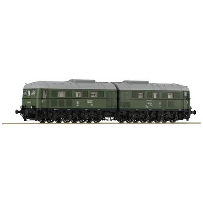 Ein grüner Modellzug mit zwei Lokomotivabschnitten auf einem Gleis. Beide Abschnitte haben Dachlüfter und sind miteinander verbunden.
