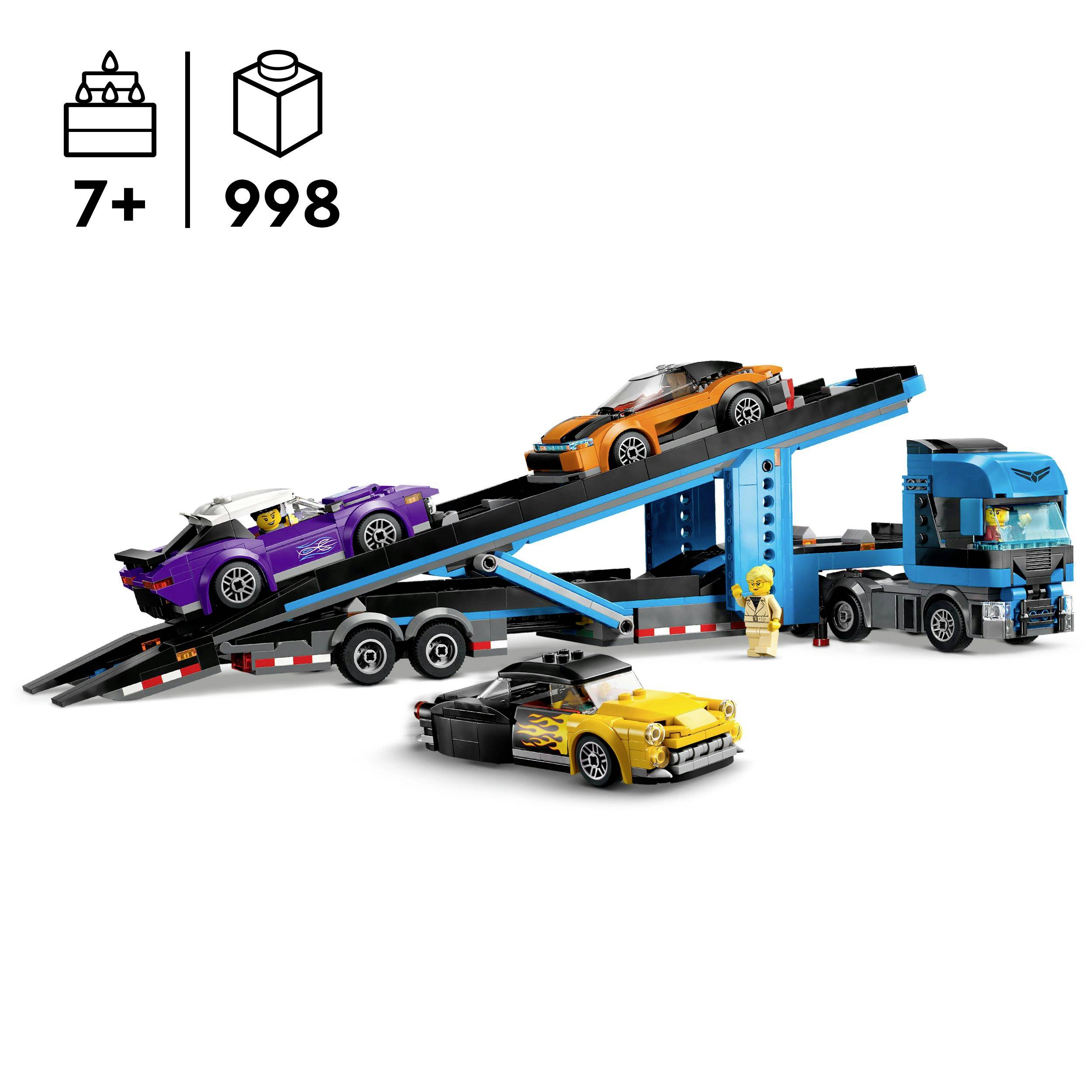 Ein LEGO-Set mit einem blauen Autotransporter, beladen mit orangenen und violetten Autos. Für Kinder ab 7 Jahren, 998 Teile.