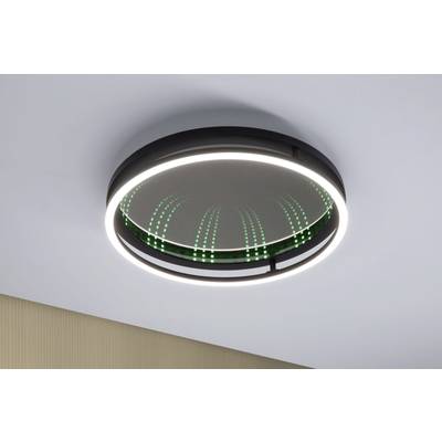 Eine futuristische Deckenleuchte mit kreisförmiger LED-Beleuchtung und reflektiver Oberfläche, die Lichtstrahlen abstrahlt.