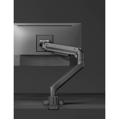 Ein Monitor ist an einem höhenverstellbaren Schwenkarm befestigt, der auf einem dunklen Tisch steht.