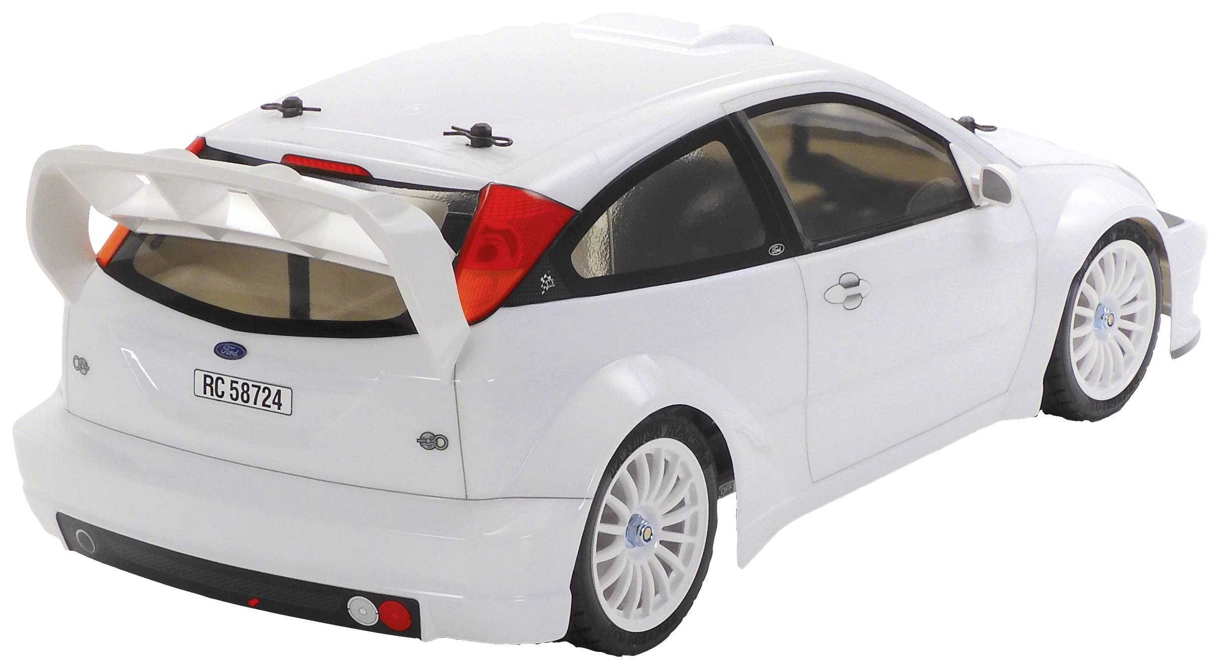 Ein weißes RC-Auto im Maßstab 1:10, das einen Rennwagen mit Spoiler und getönten Fenstern darstellt, auf einer klaren Oberfläche stehend.