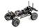 Ein ferngesteuertes Auto-Chassis mit detaillierter Federung und Motor, ohne Karosserie. Modellbau-Elemente sind sichtbar.