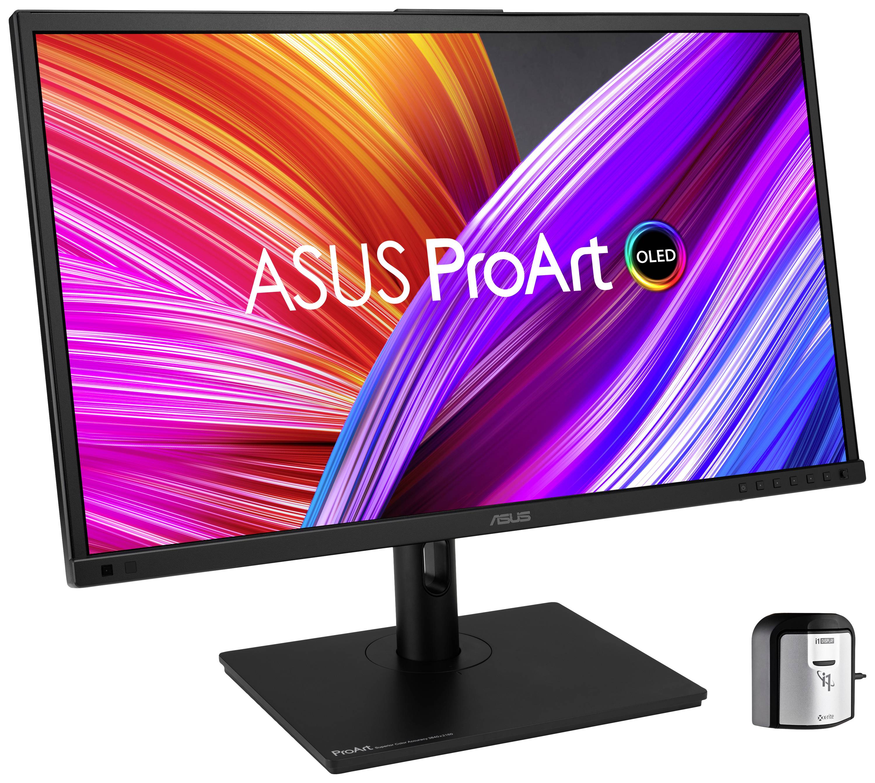 Ein ASUS ProArt-OLED-Monitor mit lebendigen Farben auf dem Display. Neben dem Monitor steht ein kleines schwarzes Kalibrierungsgerät.