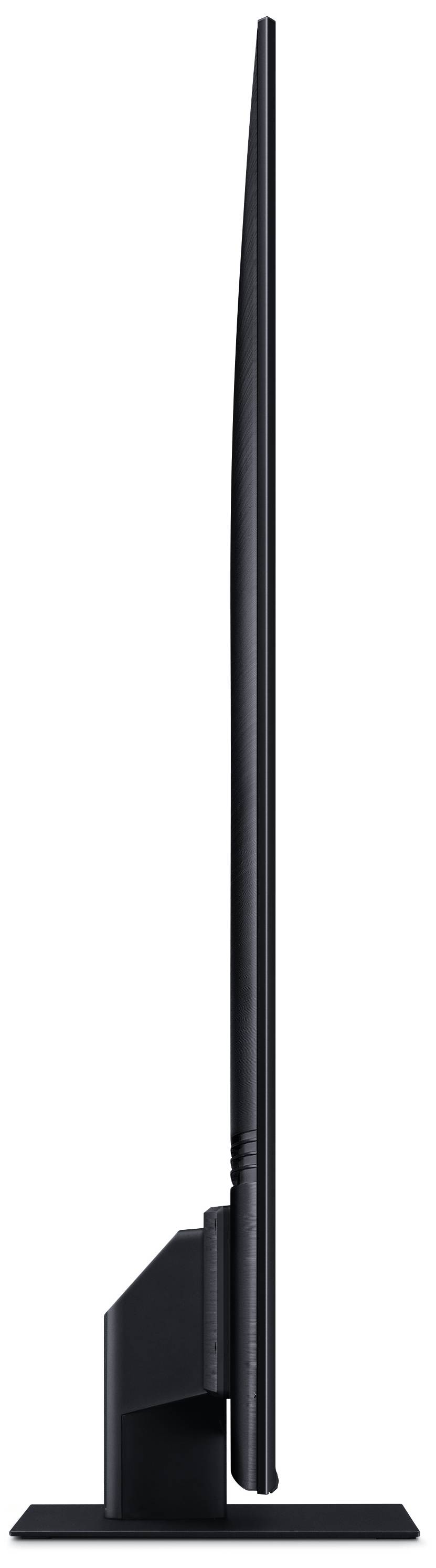 Ein seitlich aufgenommener, moderner, ultradünner Computermonitor in Schwarz, der auf einem schlichten rechteckigen Standfuß steht.