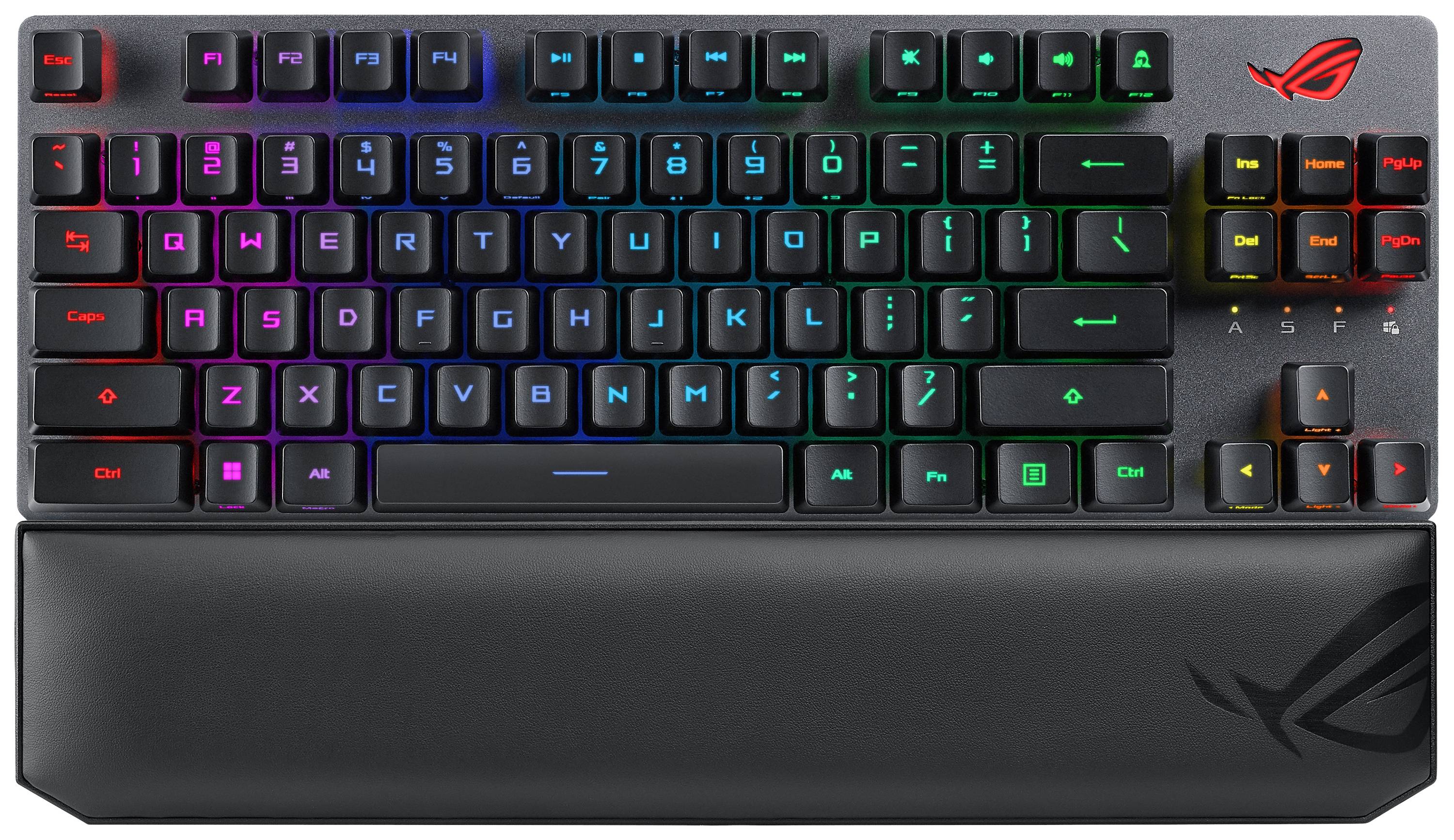 Eine Gaming-Tastatur mit bunten RGB-beleuchteten Tasten und einem abnehmbaren Handballenauflage. Oberseite zeigt ein Logo.