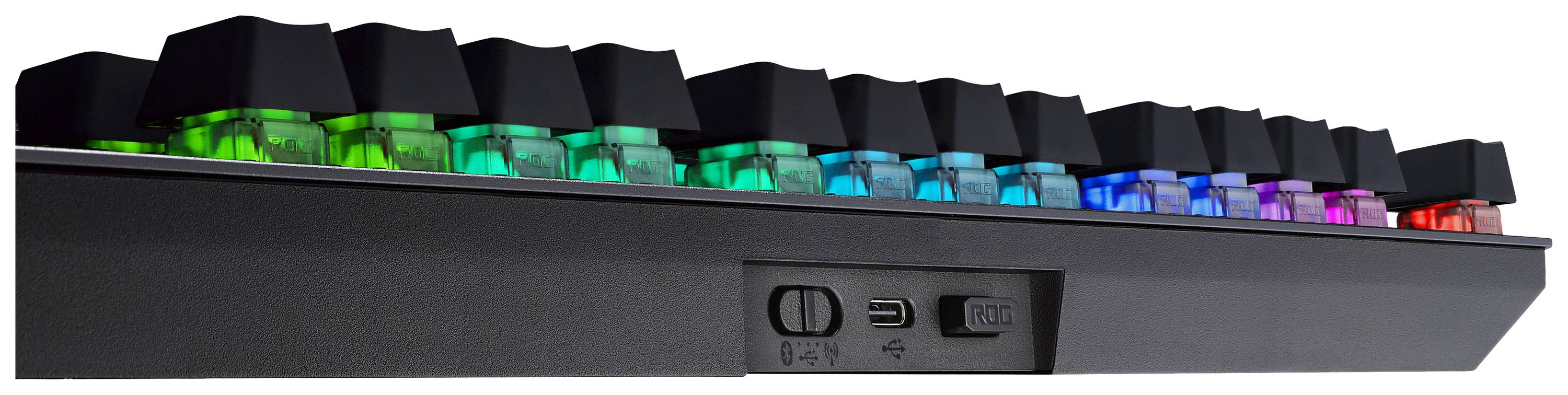 Mechanische Tastatur mit RGB-Hintergrundbeleuchtung und seitlicher Ansicht der Anschlüsse für USB und An/Aus-Knopf.