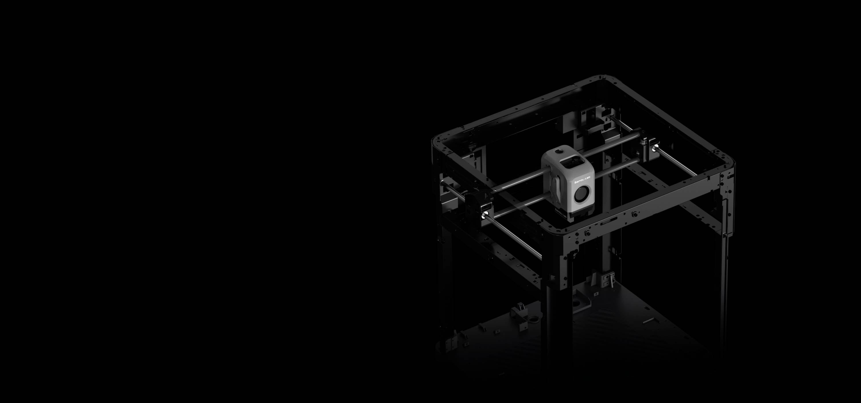 Ein 3D-Drucker in einem schwarzen Raum. Der Druckkopf ist im Fokus, umgeben von einem offenen Rahmen, bereit zum Druckstart.