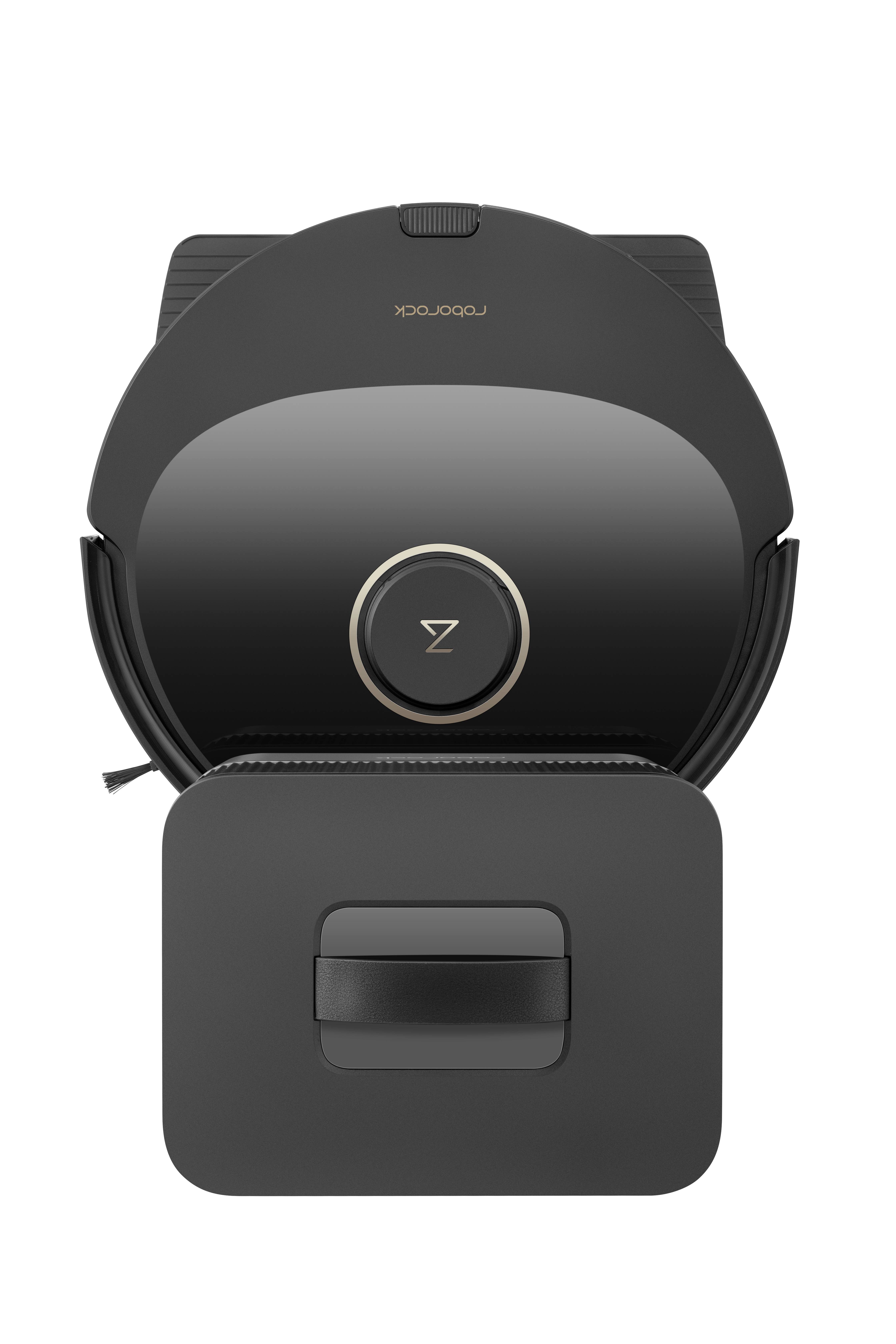 Ein schwarzer Roboter-Staubsauger in der Ladestation von oben aufgenommen.