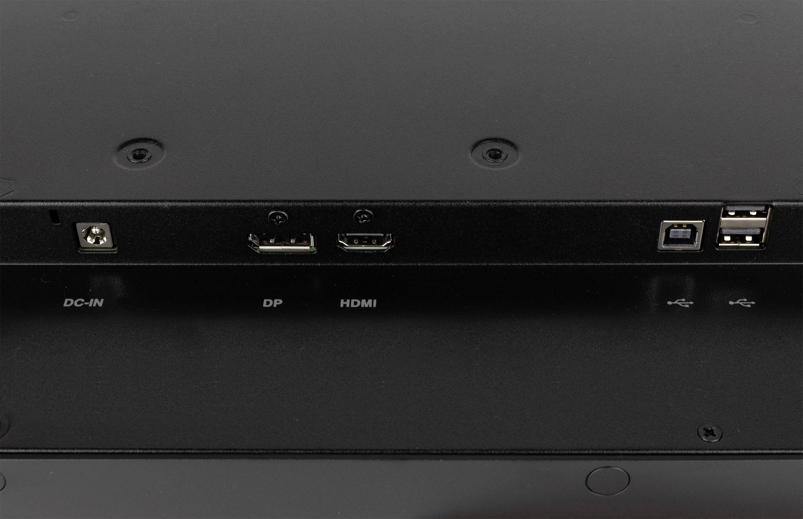 Rückseite eines elektronischen Geräts mit Anschlüssen: DC-IN, DP, HDMI und zwei USB-Ports, geeignet für verschiedene Verbindungen.