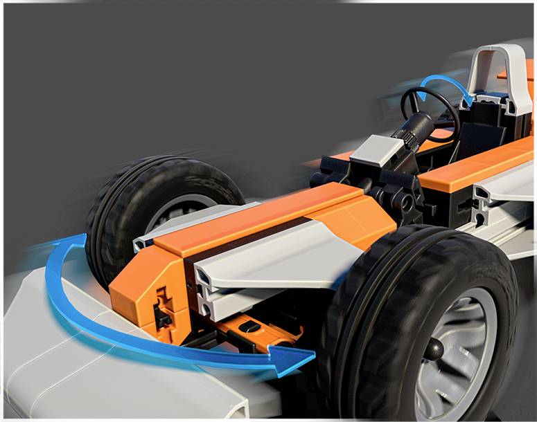 Nahaufnahme eines Modells eines Spielzeugautos mit schwarzem und orangem Design, das ein Lenkrad und sichtbare Räder zeigt.