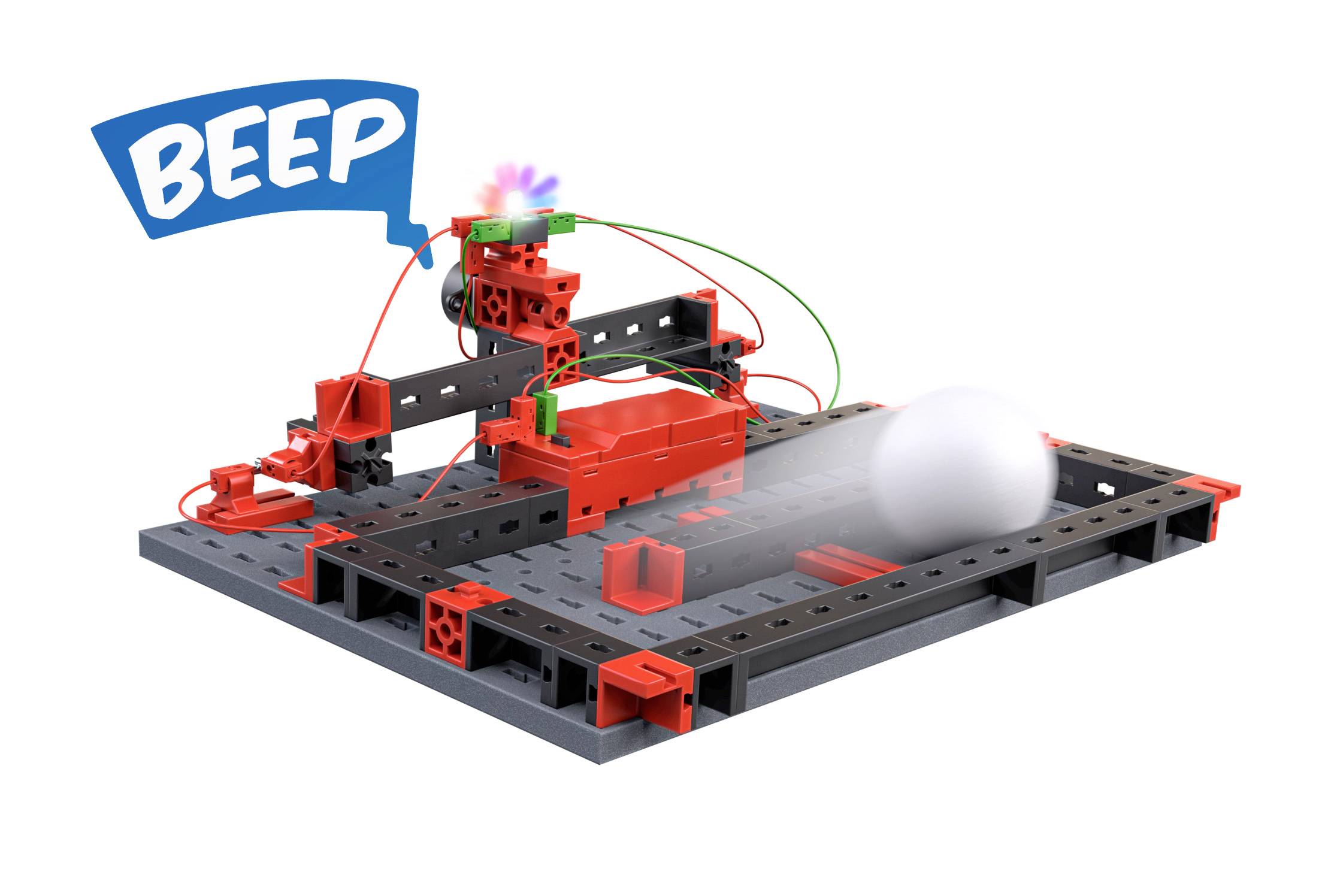 Ein Baukasten-Set mit elektronischen Komponenten, das eine Kugel über ein Förderband bewegt. Ein Lautsprechersymbol zeigt 'BEEP' an.