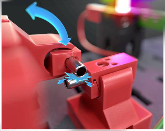 Ein rotes mechanisches Teil mit einem Pfeil, der die Bewegungsrichtung anzeigt. Elektrische Kontaktstellen, Nahaufnahme.