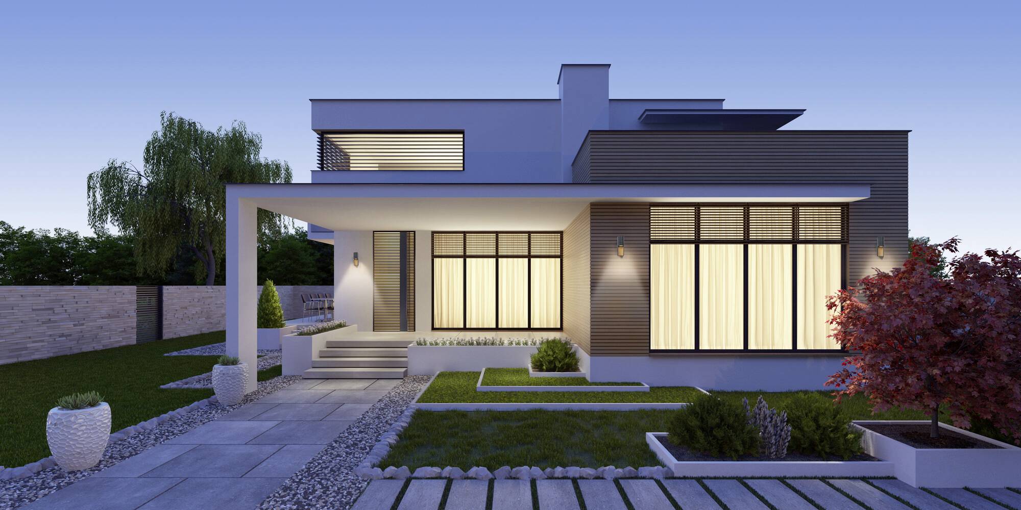 Moderne zweistöckige Villa in Dämmerung mit beleuchteten Fenstern, umgeben von gepflegtem Garten und dekorativen Pflanzen.