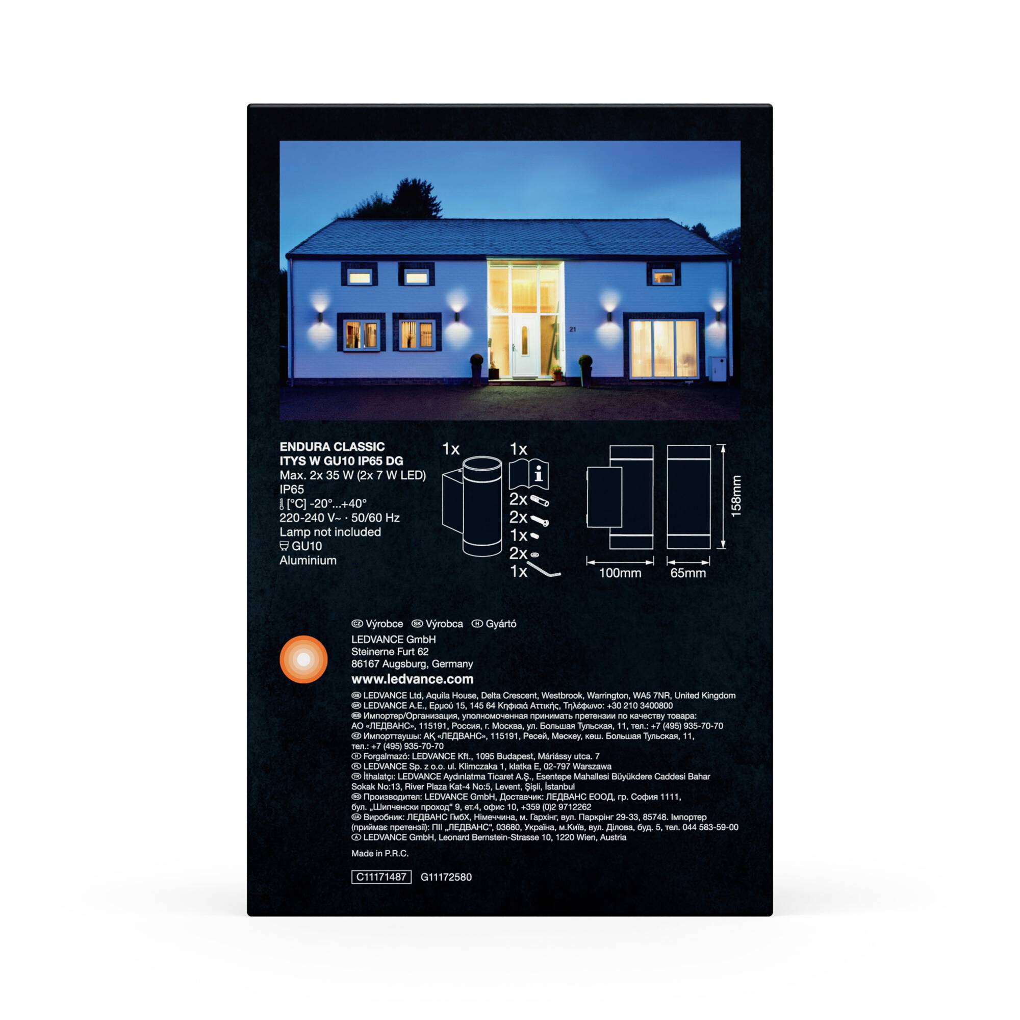 Verpackung eines LED-Lichts, zeigt Haus mit beleuchteten Fenstern, Produktabmessungen und technische Daten auf schwarzem Hintergrund.