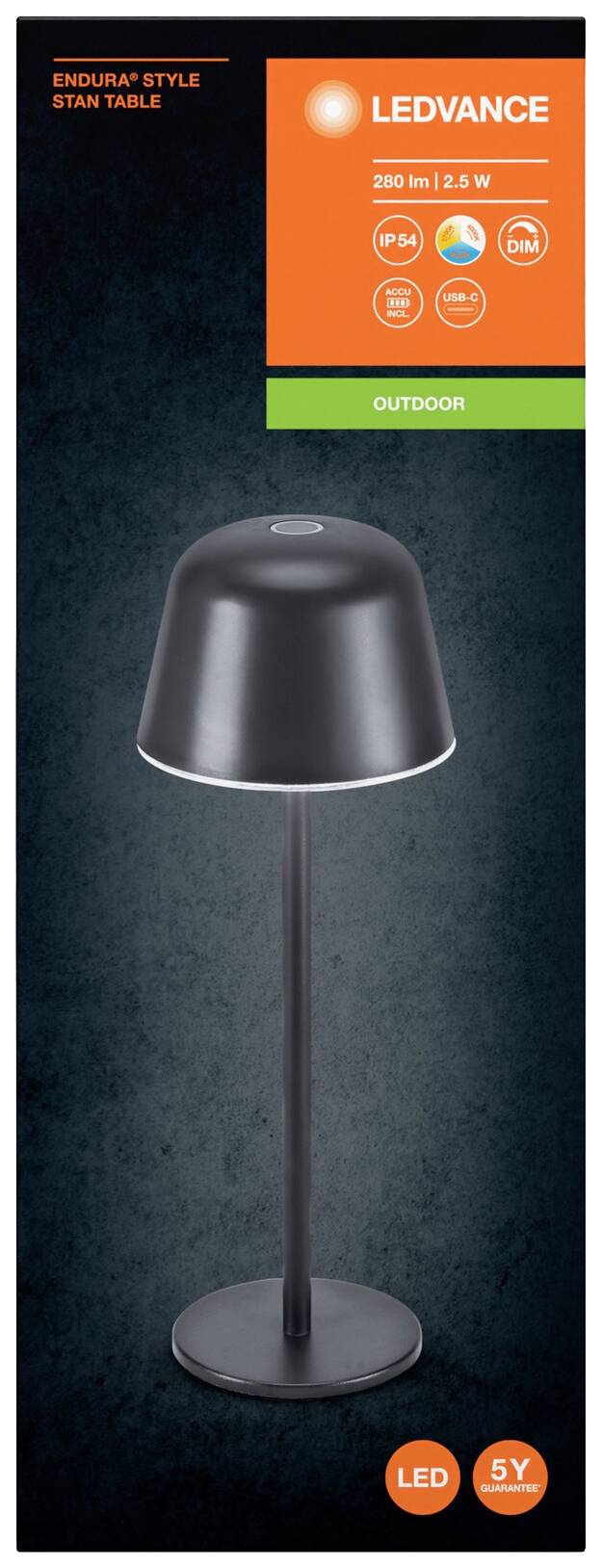 Schwarze Tischlampe mit rundem Schirm auf hohem Ständer. Beschriftung oben: 'Endura Style Stan Table', 'LEDVANCE 280 lm 2–5 W'. Geeignet für den Außenbereich.