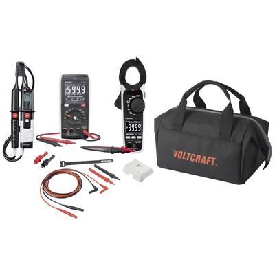Multimeter, Stromzange, Prüfgerät und Zubehör vor einer schwarzen Werkzeugtasche mit 'Voltcraft'-Logo. Elektromess-Sets.