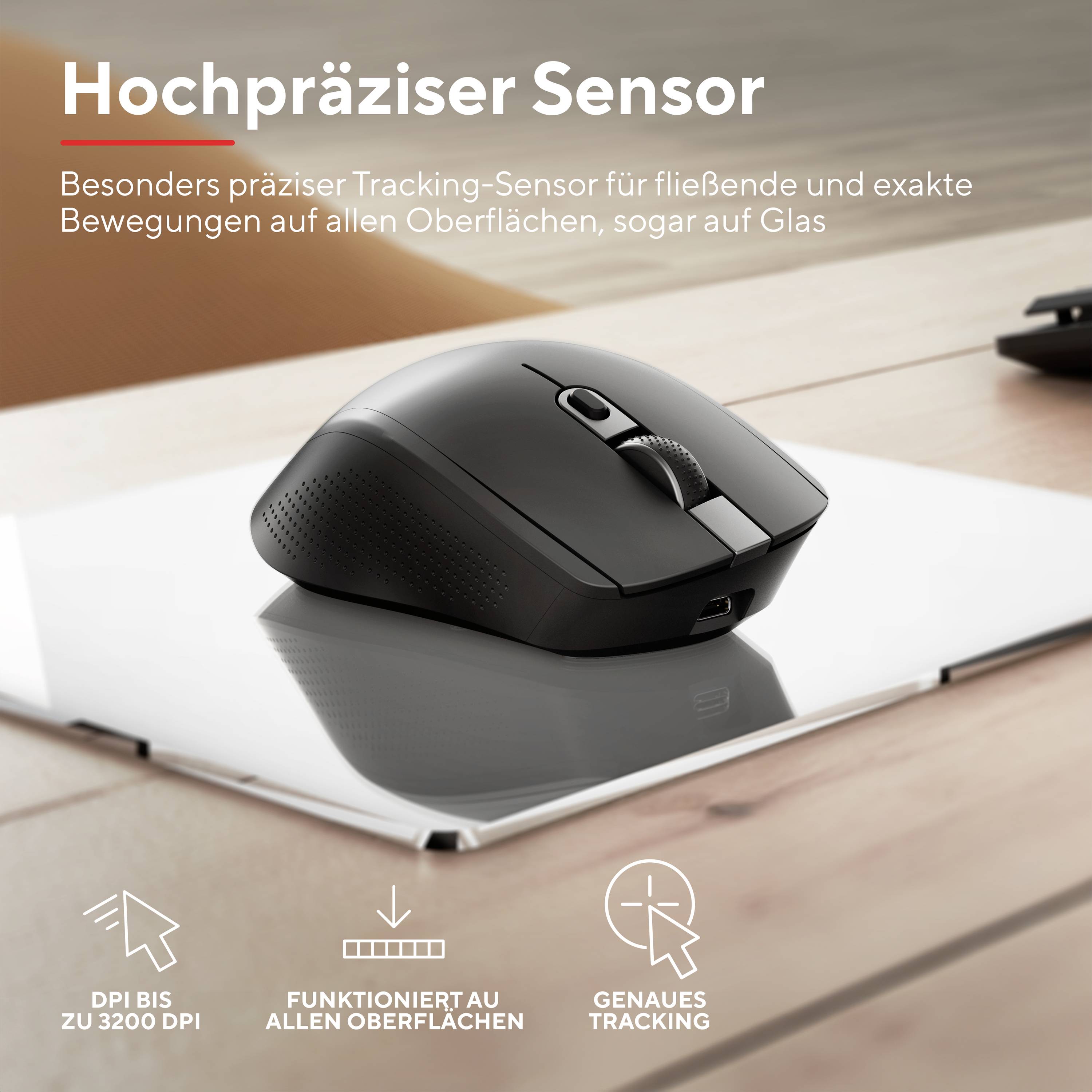 Schwarze Computermaus auf Tablet; Text 'Hochpräziser Sensor', beworben werden präzise Bewegungen auf allen Oberflächen, auch Glas.