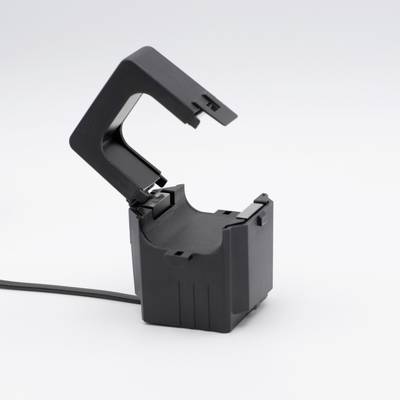 Ein schwarzer Plastiksensor mit offenem Gehäuse und Kabel, möglicherweise ein Überwachungsteil oder technologisches Gerät.