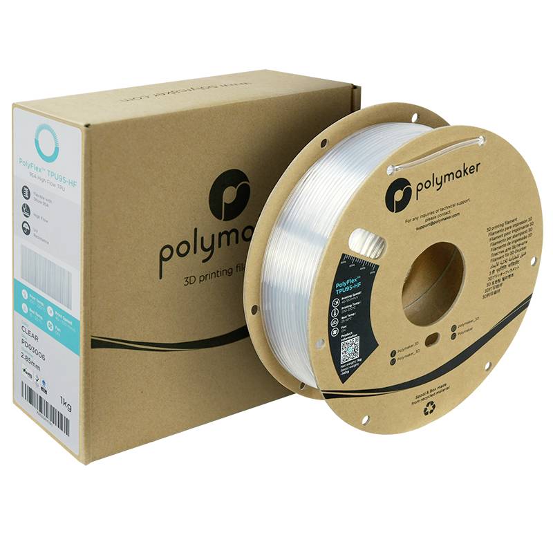 Auf dem Bild ist eine Verpackung und eine Spule mit klarem 3D-Druckfilament der Marke Polymaker zu sehen.