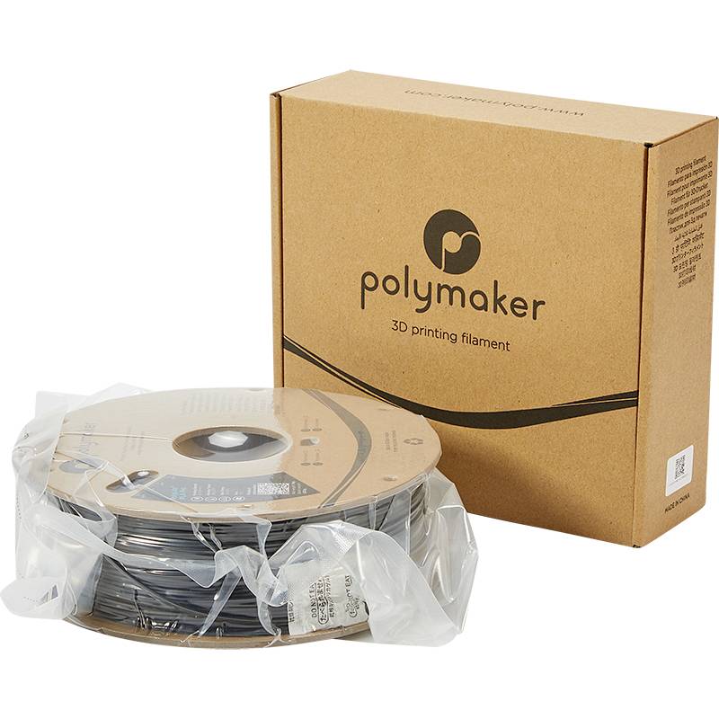 Eine Spule mit schwarzem 3D-Drucker-Filament in Plastikverpackung, daneben ein brauner Karton mit Aufschrift 'Polymaker'.