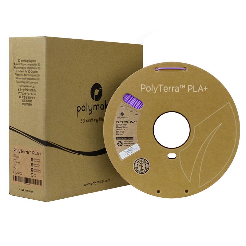 Kartonschachtel und Filamentspule für 3D-Drucker von Polymaker. Die Spule zeigt das Material 'PolyTerra PLA+' in Lila.