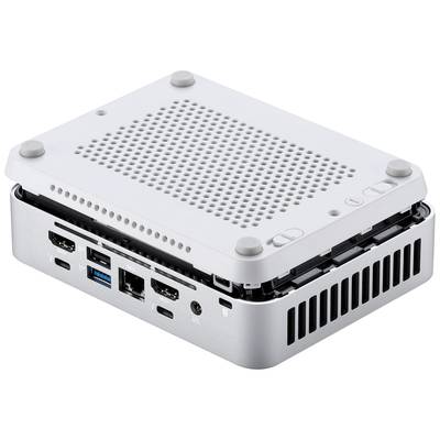 Ein kleiner, silberner Mini-PC mit abgenommenem Gehäusedeckel zeigt Lüftungsschlitze und diverse Anschlussports an der Seite.