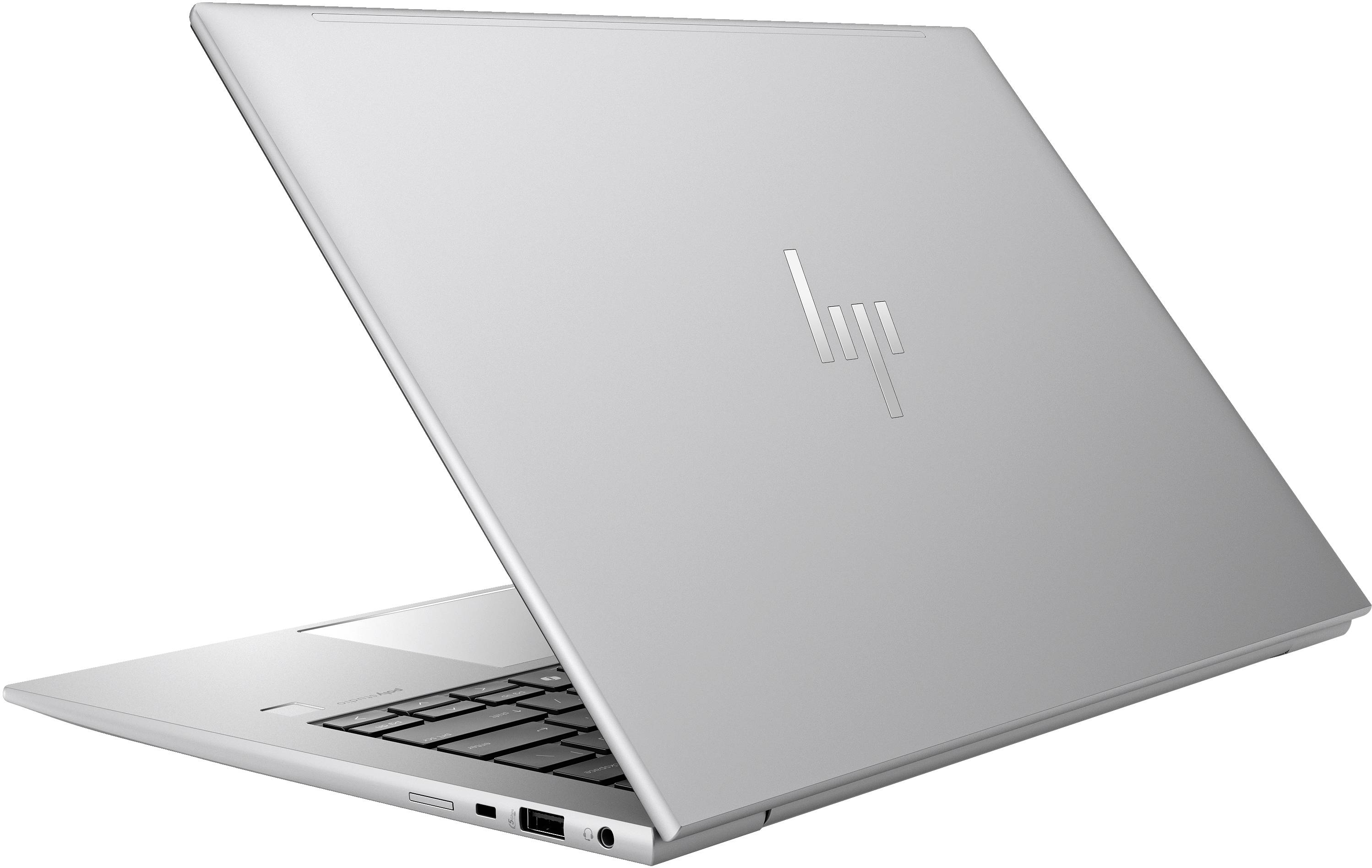 Silberner Laptop in seitlicher Ansicht, aufgeklappt, mit hervorgehobenem Logo auf der Rückseite des Bildschirms.