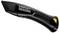 Schwarzes Stanley FatMax Universalmesser mit ergonomischem Griff und gelbem Akzent.