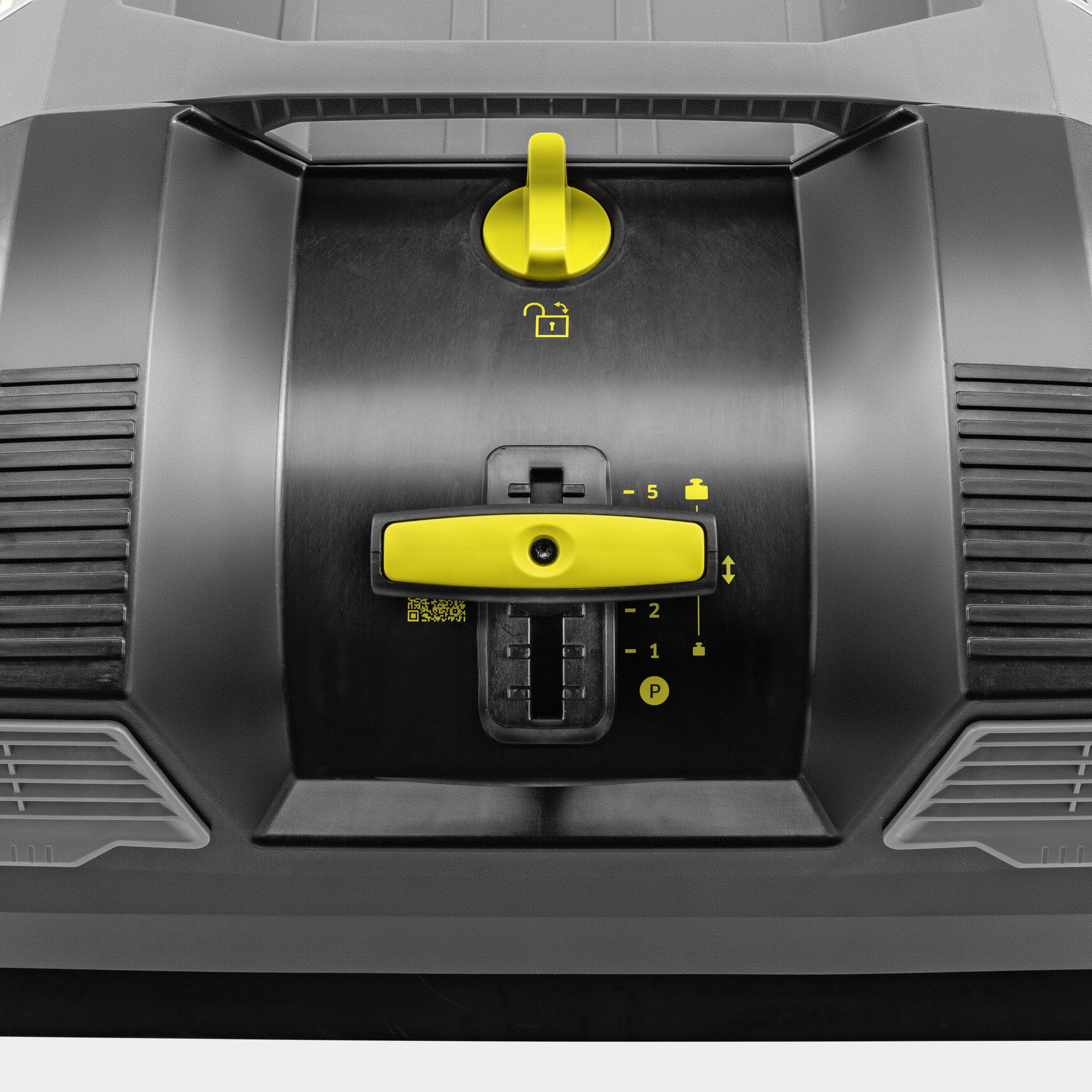 Ein schwarzes Gerät mit einem gelben Hebel, der verschiedene Einstellungen anzeigt. Symbol für Sicherheitsschloss und Höhenverstellung zu sehen.