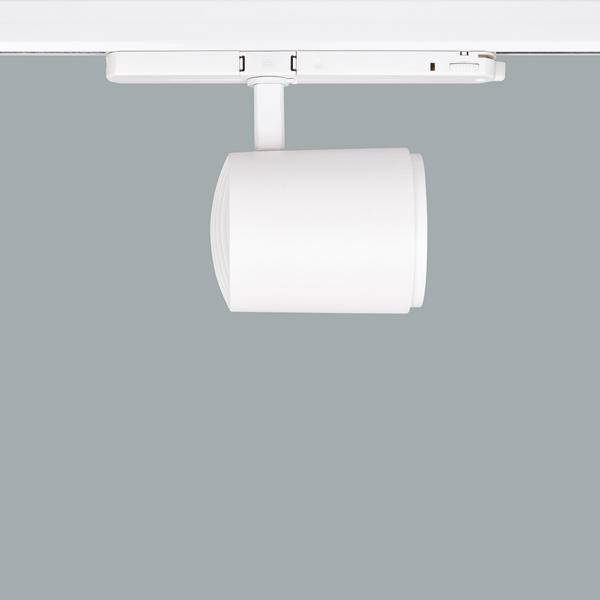 Deckenstrahler mit zylindrischem, weißem Gehäuse an einer grauen Schiene befestigt. Schlichtes, modernes Design für Innenbeleuchtung.