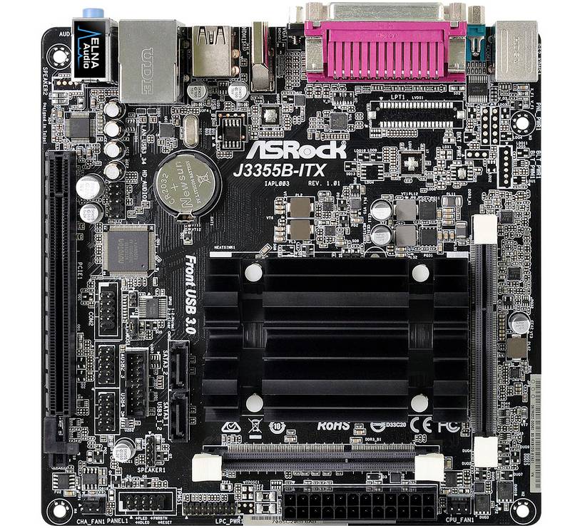 'ASRock J3355B-ITX-Motherboard, Mini-ITX-Format, mehrere USB-Anschlüsse, Audio-, Netzwerkschnittstellen und Prozessorchip sichtbar.'