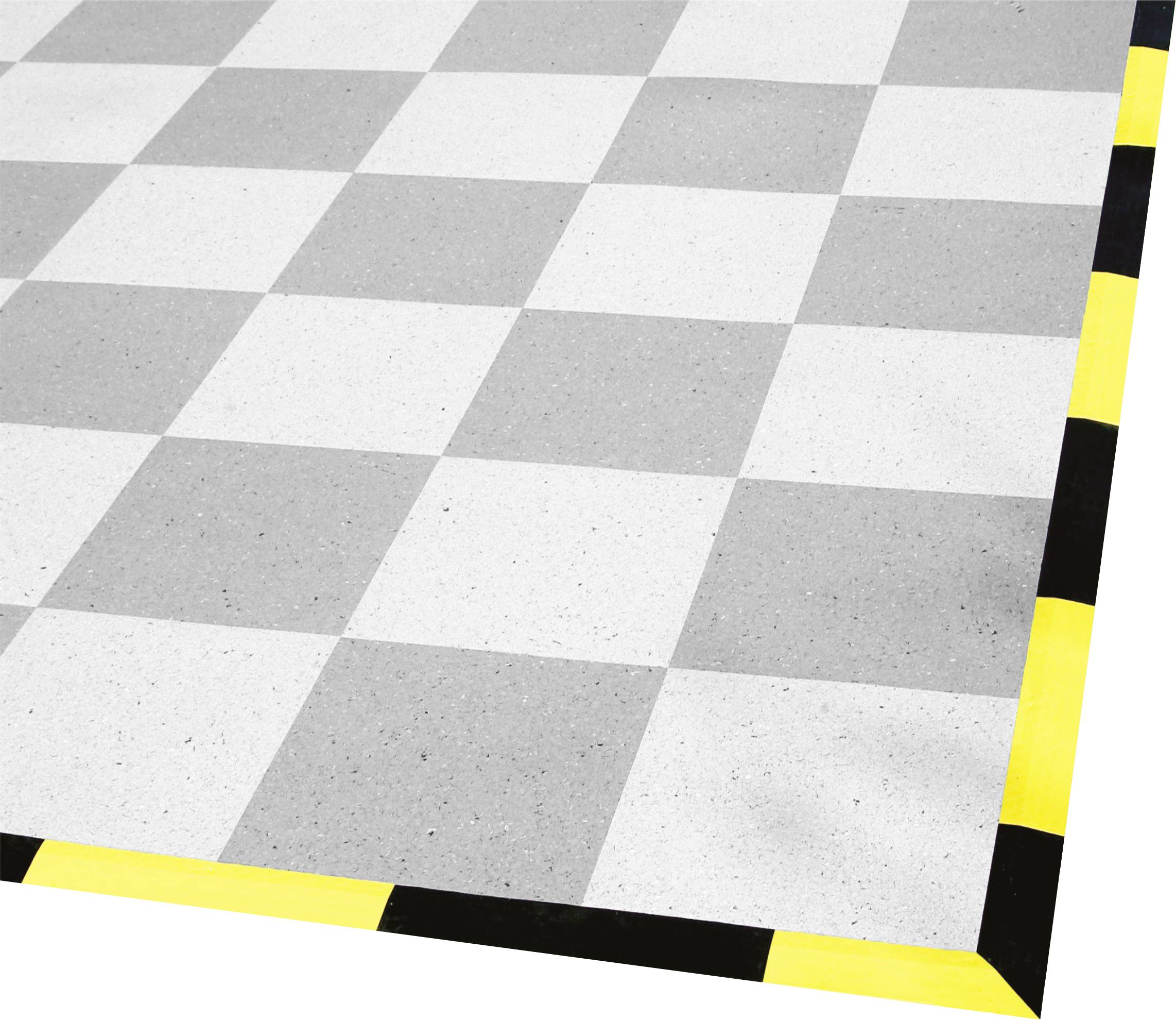 Ein Schachbrettmuster-Boden mit grauen und weißen Quadraten, umrandet von schwarz-gelb gestreiftem Band; Sicherheitsbereichsmarkierung.