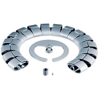 Eine zusammengesetzte, metallische Struktur in Spiralform, bestehend aus rechteckigen Elementen, liegt kreisförmig auf einem Tisch.
