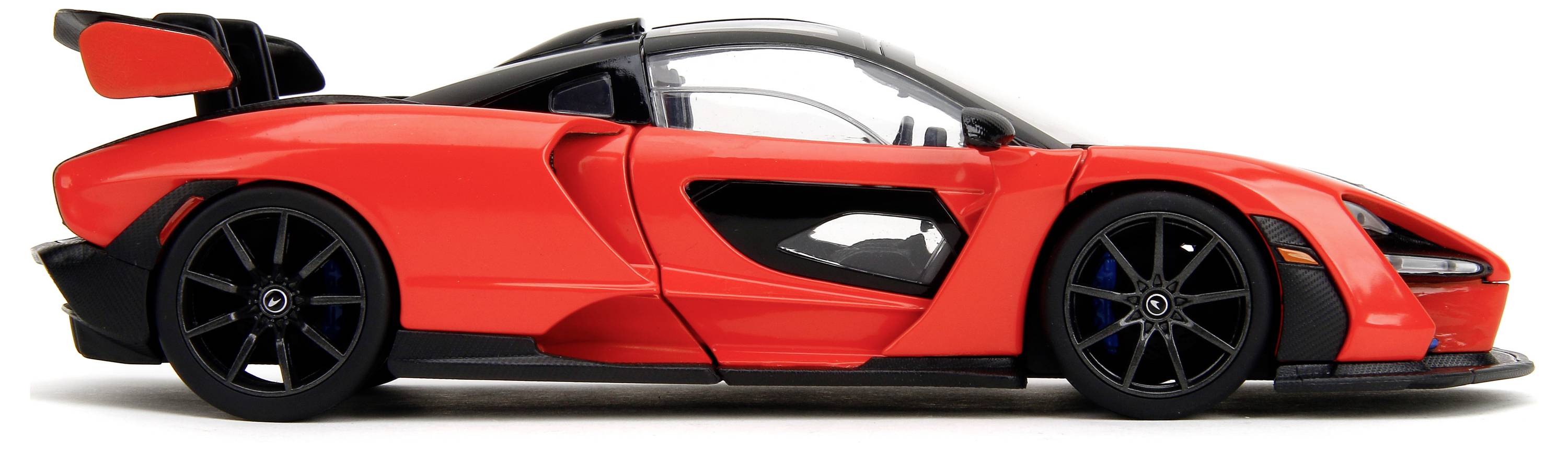 Roter Sportwagen mit aerodynamischem Design und schwarzem Dach, gezeigt aus seitlicher Perspektive. Der Heckspoiler ist auffällig.