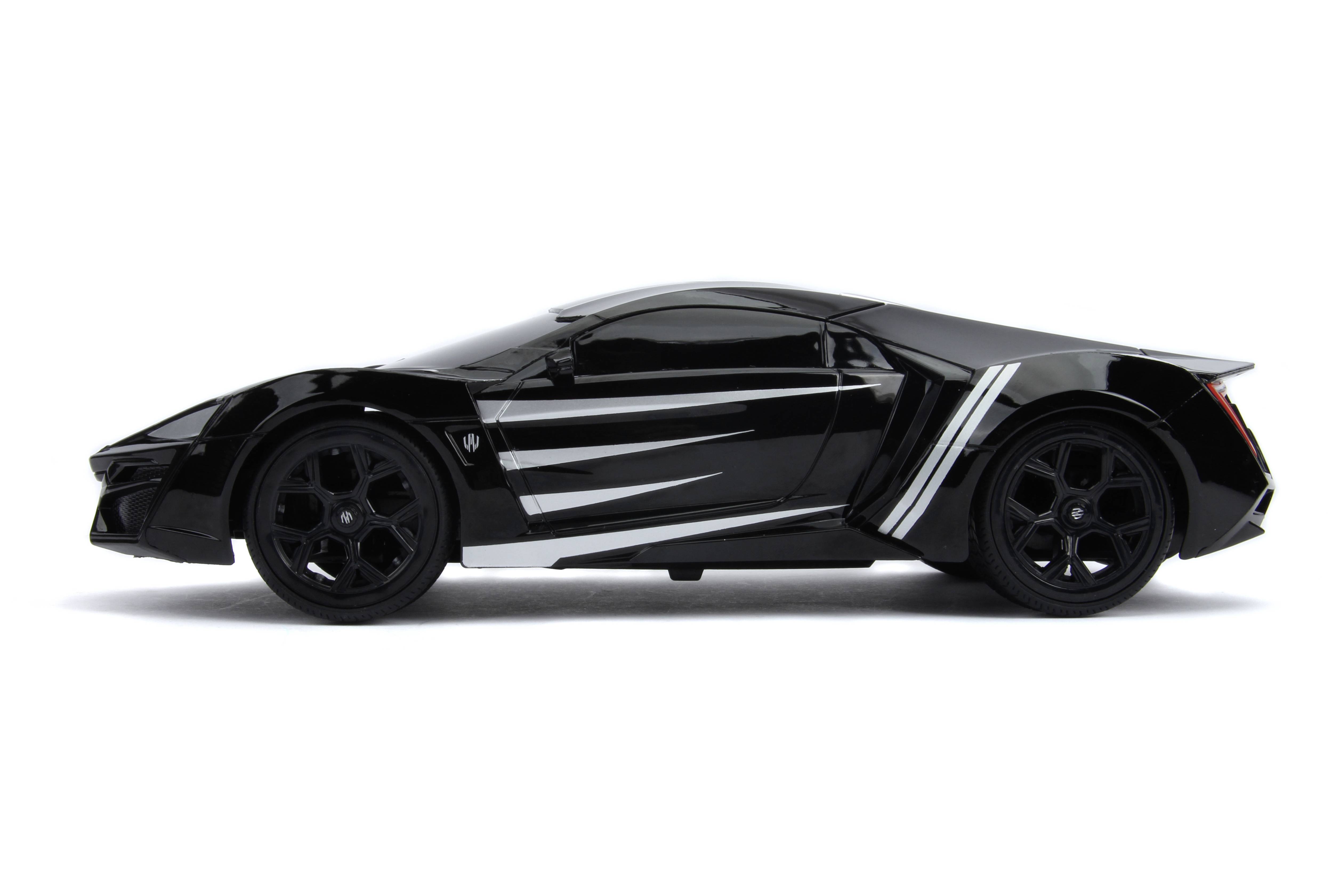 Ein schwarzes, sportliches Auto mit aerodynamischem Design und weißen Akzenten steht seitlich auf einem weißen Hintergrund.
