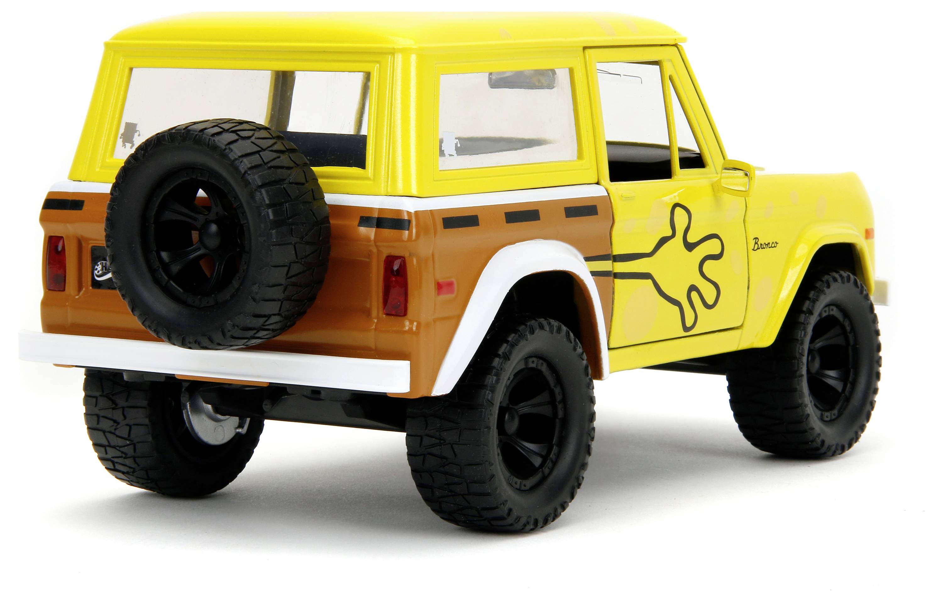 Gelbes und braunes Spielzeugauto im Offroad-Stil mit Reserverad hinten. Sichtbares Cartoon-Design auf der Seite, schwarzes Dach.