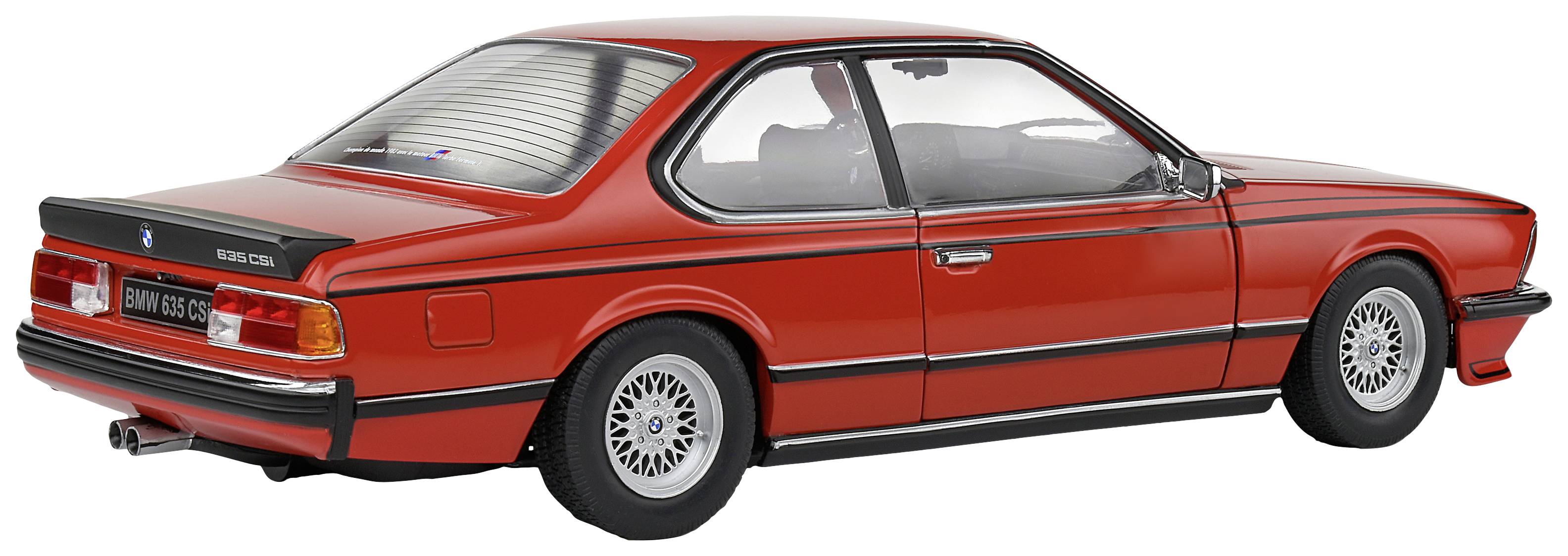 Rotes, klassisches Sportcoupé mit charakteristischen Linien und markanter Heckpartie, geparkt und von der Seite fotografiert.