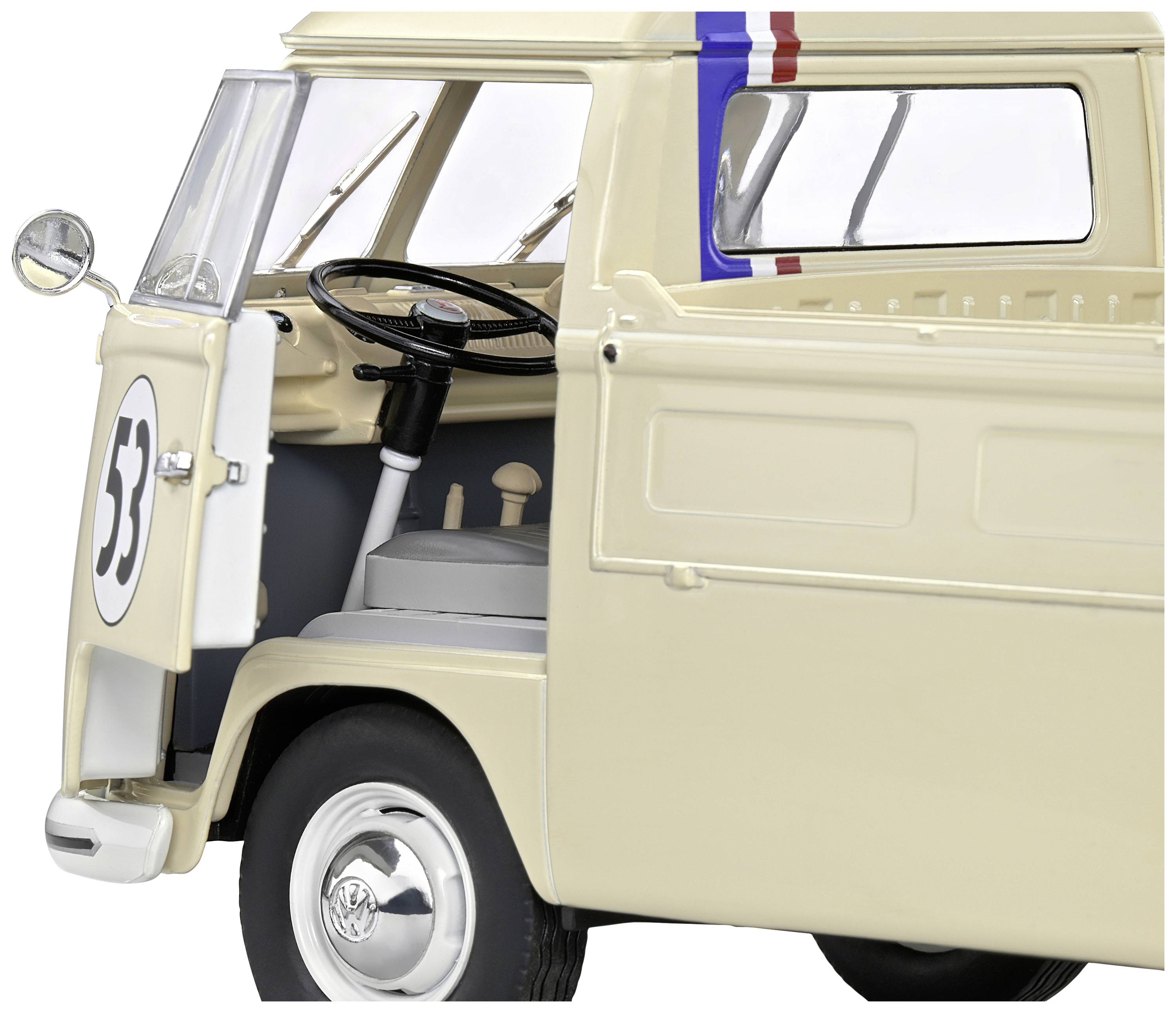 Kleiner Modell-VW-Bus in Beige mit Nummer '53' auf der Fahrertür, die offen steht. Lenkrad und Sitz sind sichtbar.