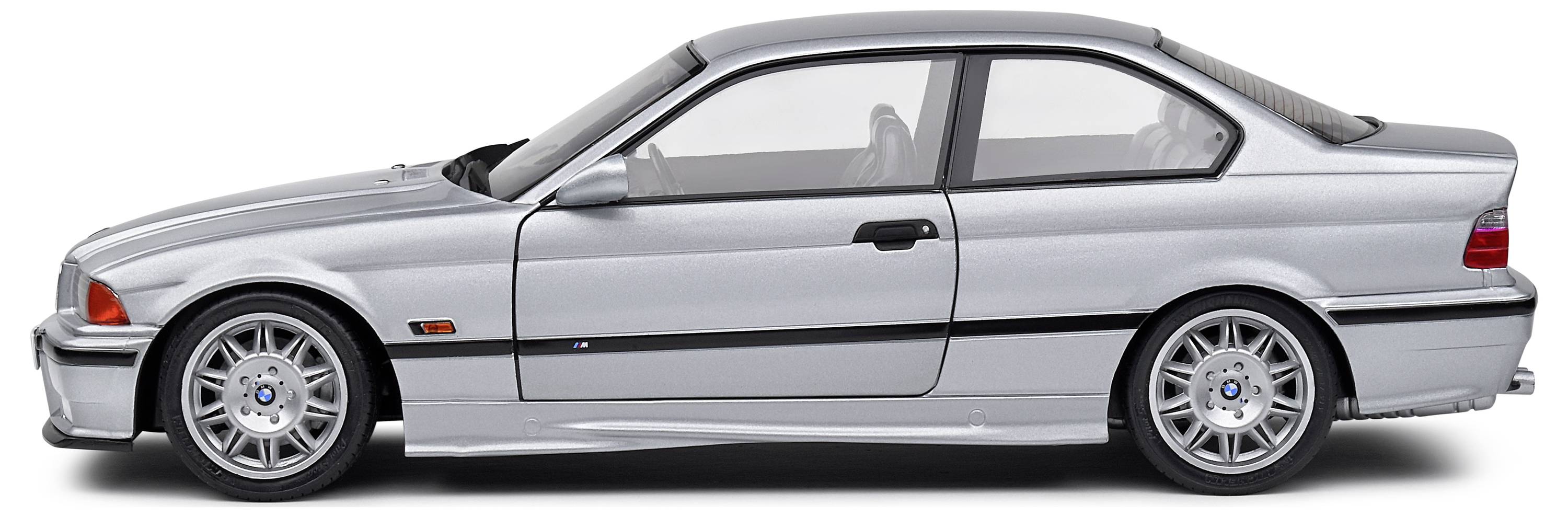 Silbernes, zweisitziges Auto im Profilansicht, BMW-Design mit markanten Linien und sportlichen Rädern.